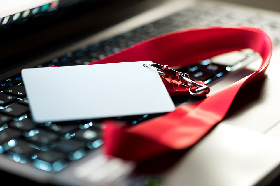 Photo of office badge on laptop